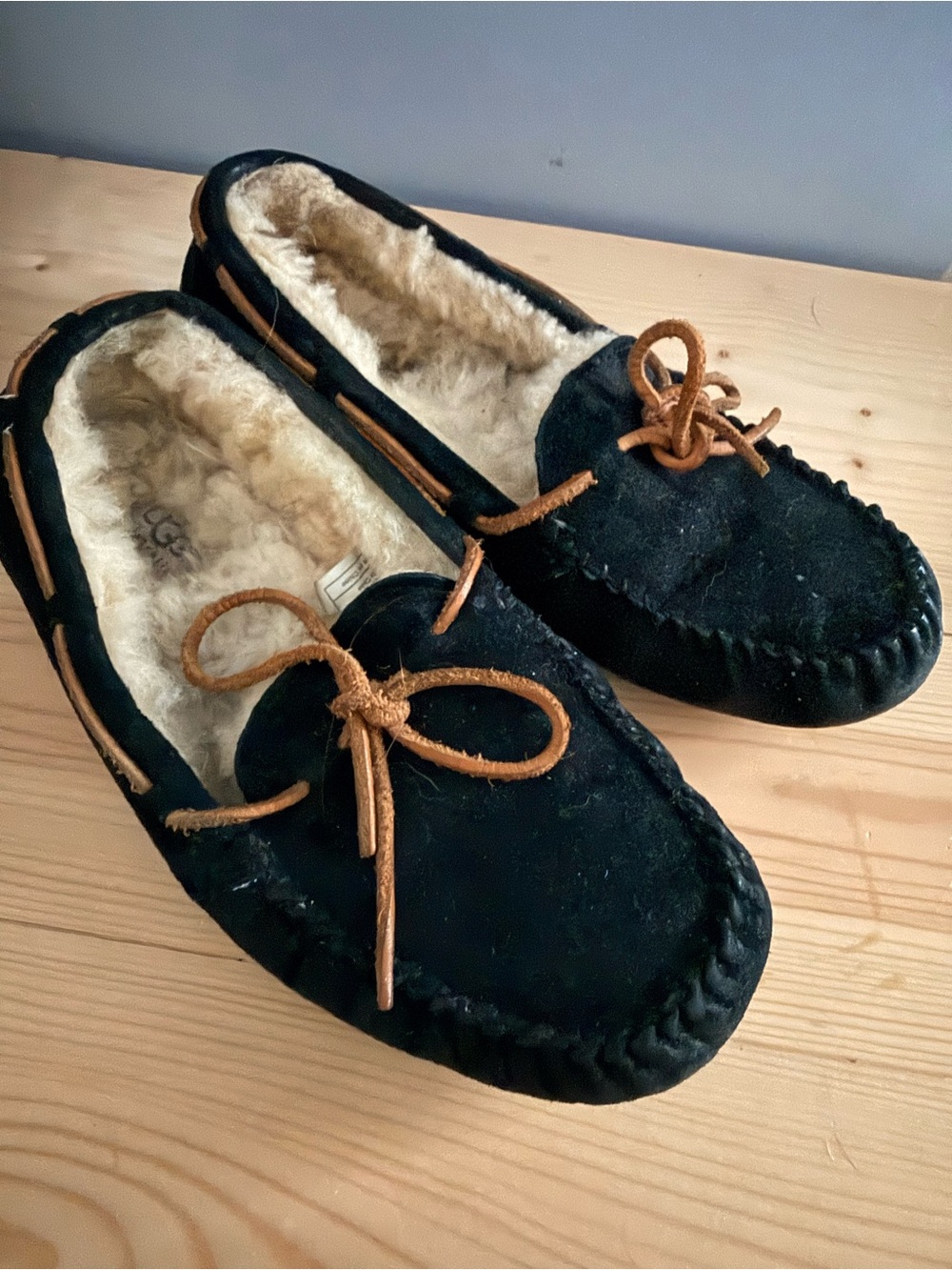 UGG Black Suede Moccasins with Tan Leather Laces